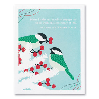 A  blue holiday card featuring an illustration of chickadees, one giving the other a berry and the quote “Blessed is the season which engages the whole world in a conspiracy of love.” —Hamilton Wright Mabie.