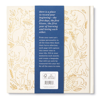 The  back cover of "Our First Year Together" featuring a sleeve with a short description of the book written in the center. 