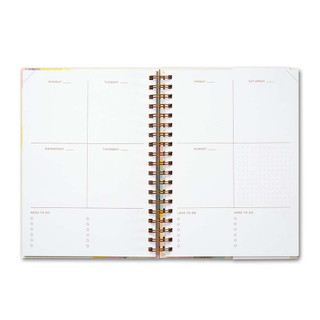 Inside of Something Wonderful Is About to Happen, a 17-month undated planner.