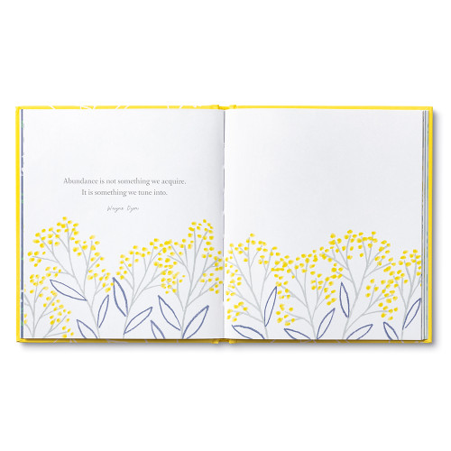 This page has a quote on the left, and a blank side on the right with florals on the bottom. 