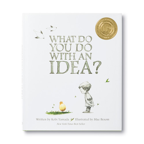 Front cover of What Do You Do With an Idea? children's book, featuring a white background and the image of a child looking down at an egg. 