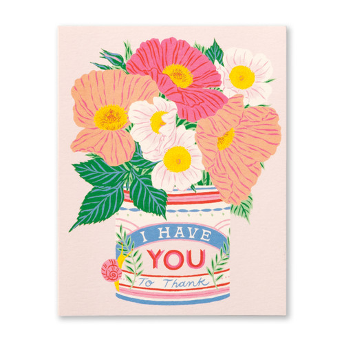 The front cover of this card features a pink background, with a bouquet, and a quote written on the bottom. 