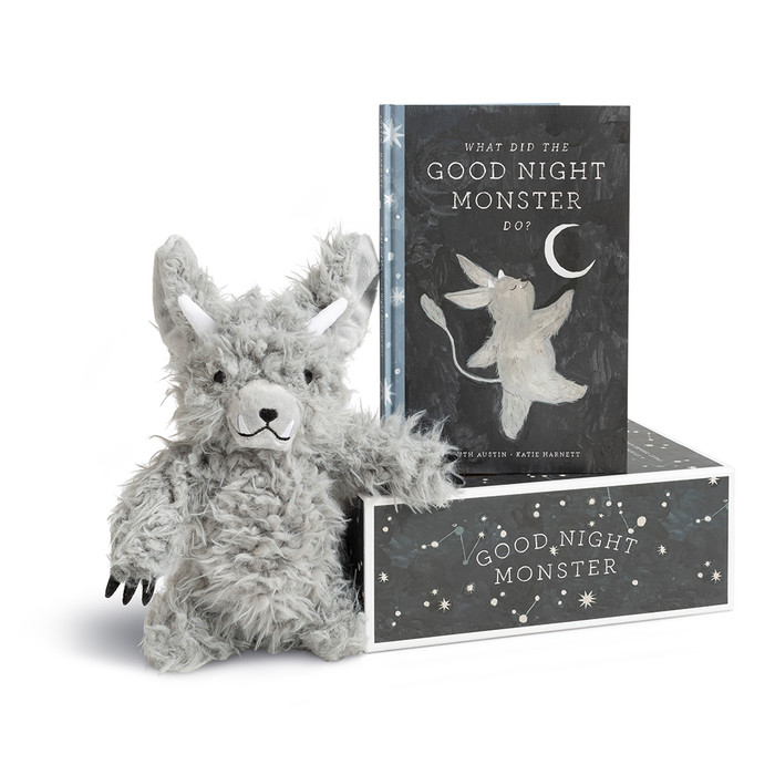 Front view of the Goodnight Monster Gift Set, featuring the book Goodnight Monster sitting atop the box, with the Goodnight Monster plush sitting to the left of the box. 