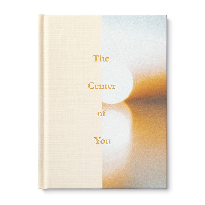 A hardcover encouragement book with the title The Center of You. Features a moving photograph, a Wibalin spine and gold foil on the cover.