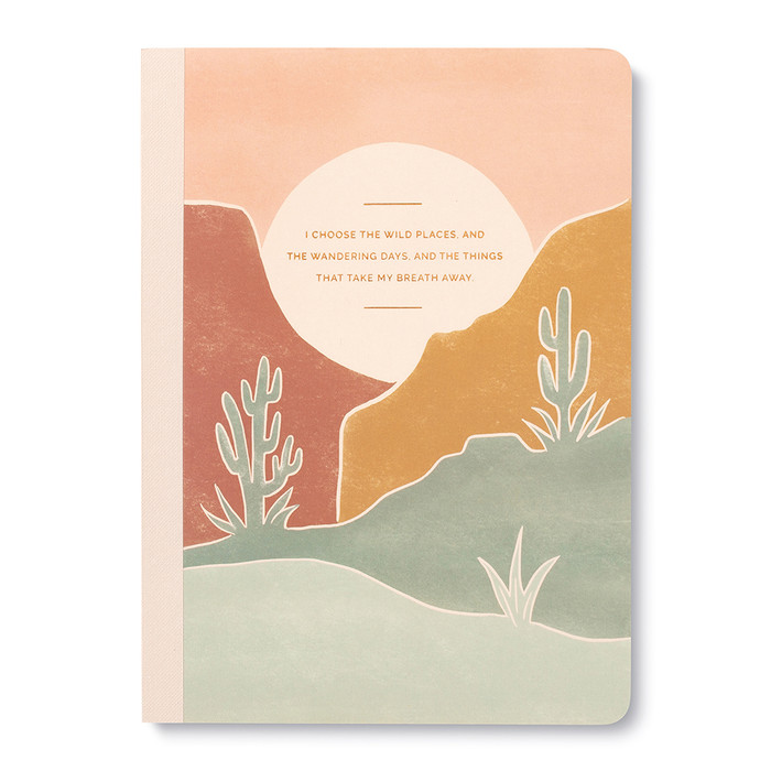 Front cover, composition notebook, features a dreamy desert landscape scene with the statement "I Choose the Wild Places, and the Wandering Days, and the Things That Take My Breath Away."