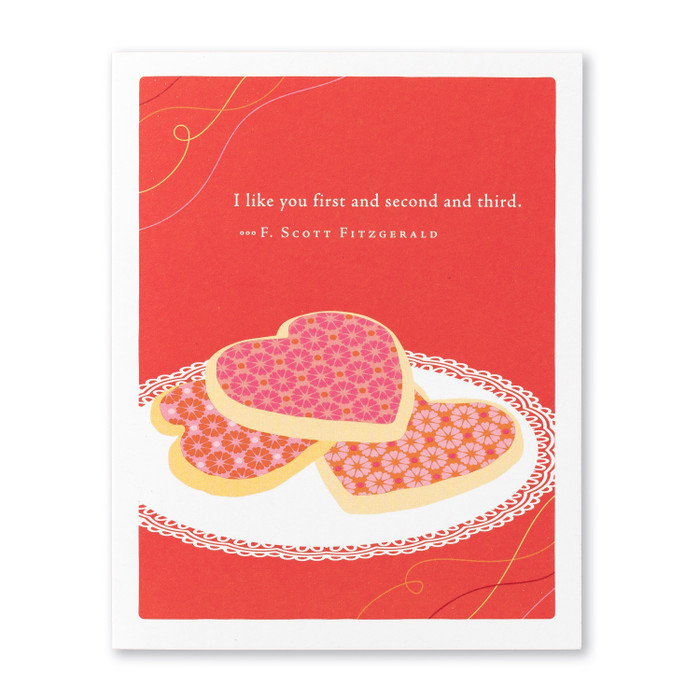 This card shows a red background with a plate of heart shaped cookies, and a quote on the top. 