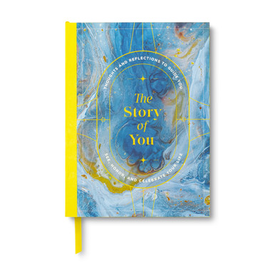 The front cover of "The Story of You: Thoughts and reflections to guide you, see, honor, and celebrate your life" guided journal. The cover has blue hues, yellow and gold marbled pattern.