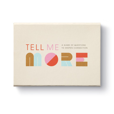 The front cover of this conversation starter card box features a beige background, and the title "Tell Me More: A game of questions to deepen connection". The box is illustrated with people interacting through conversation, and features a magnetic lid with a set of 52 cards and directions.
