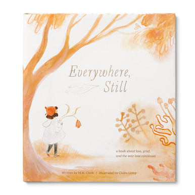 Front cover of the childrens illustrated book "Everywhere, Still: a book about loss, grief, and the way love continues", written by M.H. Clark and illustrated by Claire Lemp. The cover has various tones of calm oranges and corals, the illustration features a child holding a single flower, walking under a tree.