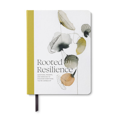 This image shows the front view of the guided notebook, "Rooted in Resilience" - A Guided Journal of Questions, Prompts, and Exercises to Discover Everything You’re Capable of. The cover design has muted shades of mustard yellow, green, peach, and grey on a white background with floral watercolor.