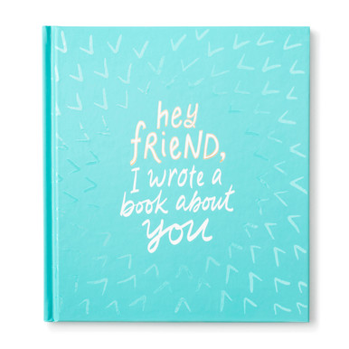Front cover of the fill-in friendship gift book, Hey Friend, I Wrote A Book About You. A personalized gift book to celebrate a friend. The cover is teal and has the title printed in gold and white foil.