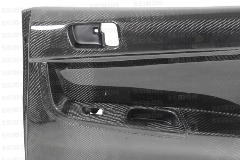 Seibon 08-12 Mitsubishi Evo Carbon Fiber Rear Door Panels - DP0809MITEVOX-R