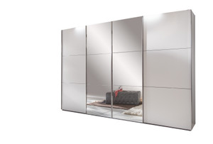 Tesoro 4 sliding door wardrobe with the two centre doors fitted with mirror glass Tesoro 4 sliding door wardrobe with the two centre doors fitted with mirror glass