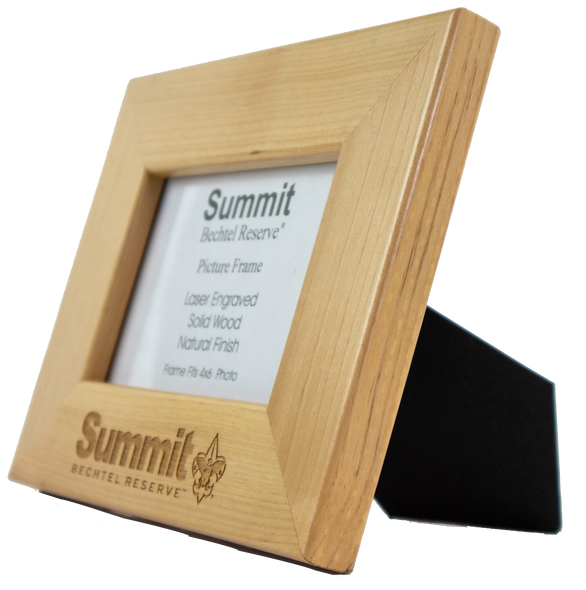 angled view of 4x6 picture frame with thick wooden borders and engraved Summit logo centered on the bottom, which shows black back piece to prop up the frame. angled view of 4x6 picture frame with thick wooden borders and engraved Summit logo centered on the bottom, which shows black back piece to prop up the frame.