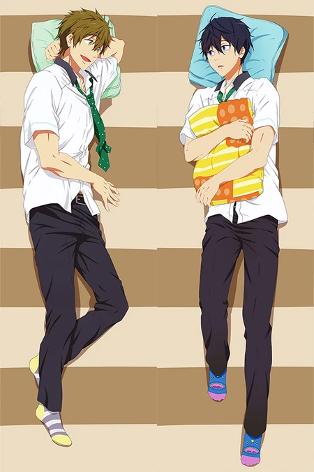 Makoto Tachibana and Haruka Nanase dakimakura body pillow case artwork from Free! with white shirts, green ties, dark trousers and colourful socks; Haruka holds a yellow-orange cushion.