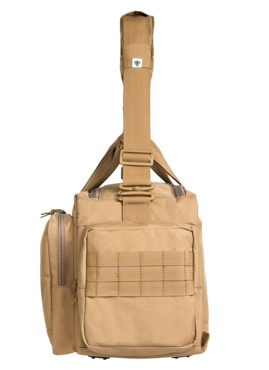 Carry your pistols and ammunition safely and securely in First Tactical’s Recoil Range Bag. Designed with tough 600D polyester and closed foam padding to keep your reserve organized while on the go. Specialized internal pockets and compartments suit all your storage needs in this first class tactical bag.