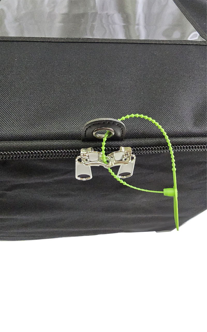 Main compartment zipper heads with ring lock to secure with grommet