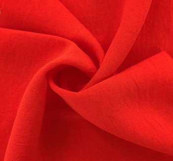C.E.Y. Air Flow Solid Orange fabric by the yard, 58/60 inches wide