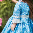 The sleeve's detail of the blue 18 inch doll dress in close up. The sleeve's detail of the blue 18 inch doll dress in close up.