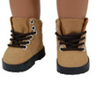 An 18 inch doll models the hiking boots with laces tied low on ankle. An 18 inch doll models the hiking boots with laces tied low on ankle.