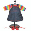Against white backdrop the Bitty Baby rainbow shirt and denim skirt hang from our clothing dress form and red shoes sit below. Against white backdrop the Bitty Baby rainbow shirt and denim skirt hang from our clothing dress form and red shoes sit below.