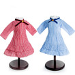 Red and blue check dresses 18" doll clothes on our 18" doll clothing display stands.
