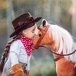 Little House doll, wearing complete frontier outfit, shown with chestnut 18" doll horse. Outfit and horse both fit 18" American Girl dolls.