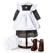 A miniature historic kitchen maid uniform by The Queen’s Treasures® is displayed on a dark wooden doll stand against a solid white background. The outfit includes a black long-sleeved dress worn beneath a bright white apron with ruffled shoulder straps and a wide waistband. A matching white fabric mop cap rests on the surface to the lower left, and a pair of miniature dark brown lace-up leather boots stands to the lower right.