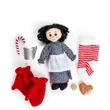The Christmas stocking set includes a doll-sized version of Laura's ragdoll, Charlotte, a pair of 18" doll mittens, a doll-sized cup, striped Christmas stocking, candy cane, heart-shaped cake, and a replica Indian Head penny.