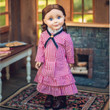 The red and white check dress, for 18" dolls, features a high collar with ribbon necklace; just like dresses the real-life Laura Inaglls and Mary Ingalls wore. The red and white check dress, for 18" dolls, features a high collar with ribbon necklace; just like dresses the real-life Laura Inaglls and Mary Ingalls wore.