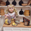 Nellie Oleson doll with 2 mason jars filled with chocolate chip cookies and oat cookies in store setting.