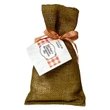 Little House on the Prairie Half-Pints Cinnamon Oatmeal Bar Mix packaged in burlap bag with gingham ribbon and label.
