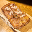Harriet's Tea cake baked in a loaf shape and sitting on wooden board Harriet's Tea cake baked in a loaf shape and sitting on wooden board