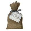 Little House on the Prairie Ma's Buttery Biscuit Mix packaged in burlap bag with gingham .ribbon and label.