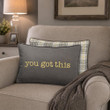 You've  got  this embroidered on a gray pillow with a plaid back.