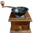 An antique wooden box coffee grinder isolated on a white background, featuring a dark cast iron hopper bowl, a hand crank with a wooden knob, and a closed small drawer at the bottom.