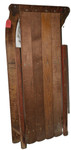 Top view of antique primitive wooden child's sled showing slatted seat deck and red painted side rails