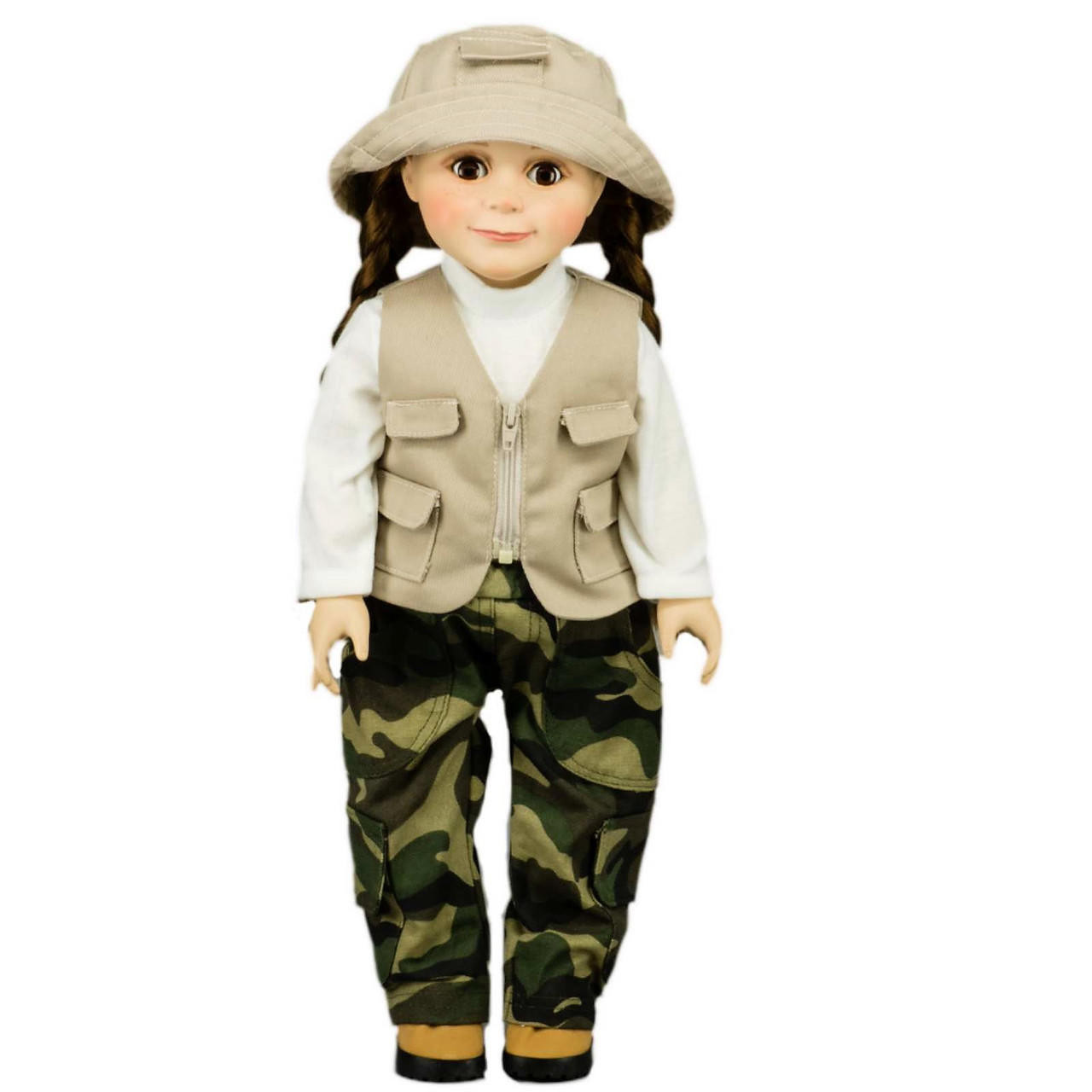 An 18-inch doll with brown eyes and dark hair styled in two braids stands facing forward against a plain white background. The doll is wearing a fishing or outdoor adventure outfit consisting of a tan multi-pocket utility vest over a light grey long-sleeved shirt, paired with green and brown camouflage print cargo pants and a matching tan bucket hat.