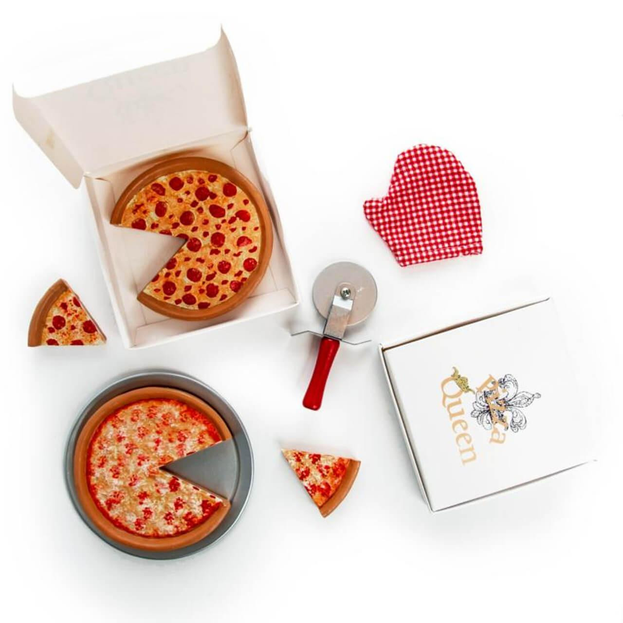 This top-down photo shows a toy pizza party set designed to fit 18-inch American Girl® dolls.
