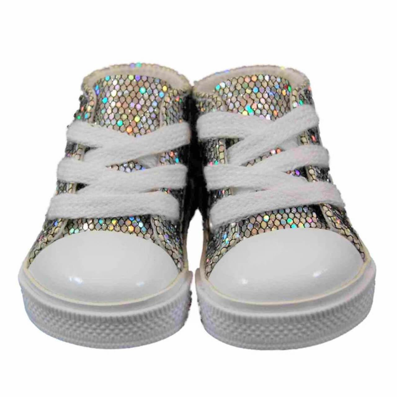 A pair of miniature high-top doll sneakers with shimmering, silver holographic uppers featuring a scaly pattern. The shoes are placed side-by-side facing forward against a solid white background, showing thick white laces, textured white rubber midsoles, and glossy white toe caps.