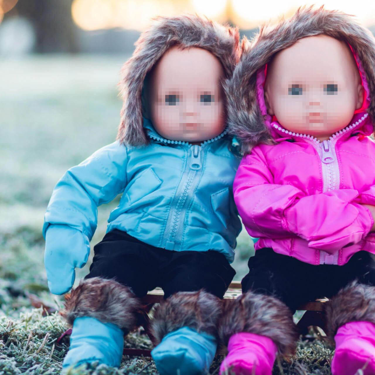 Close up of the Blue and the Pink Bitty Snow and Ski Wear Set. Perfect for 15" Bitty Baby twins.