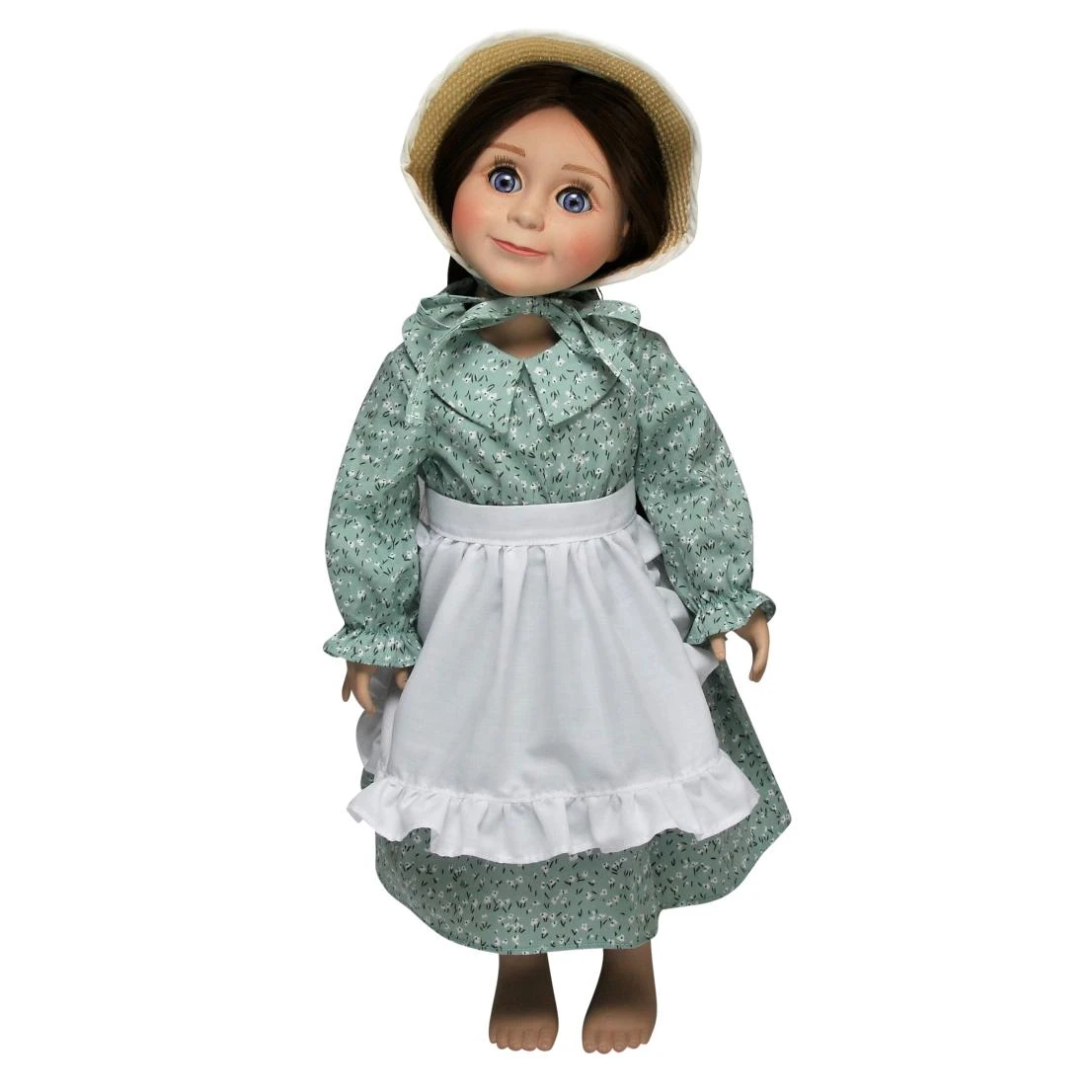 An 18" pioneer doll stands on a white background wearing a green calico dress, white ruffled apron, and fabric bonnet, designed to fit an 18" American Doll.