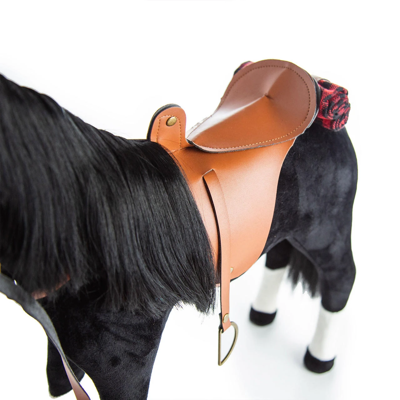 Side view of 18 inch doll pony saddle.