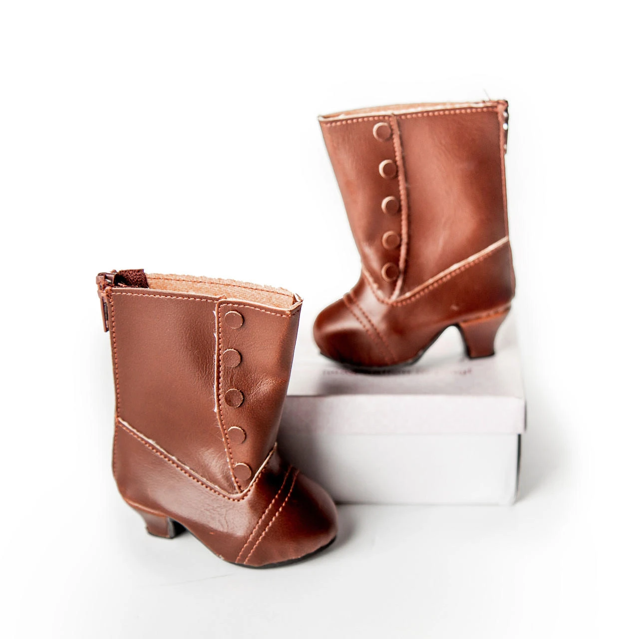 18 inch doll frontier boots come with their own shoe box.