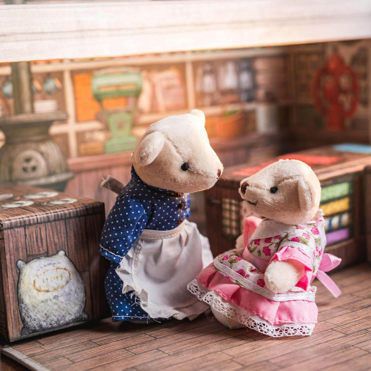 Little House on the Prairie Nellie Oleson bear wears her iconic pink dress.