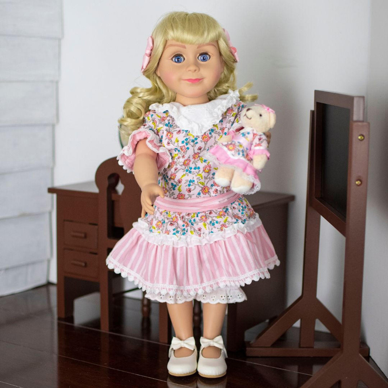 https://cdn11.bigcommerce.com/s-m5vcu70215/images/stencil/1280x1280/products/248/2466/the-queens-treasures-little-house-on-the-prairie-nellie-oleson-18-inch-doll__62971.1692302407.jpg?c=1