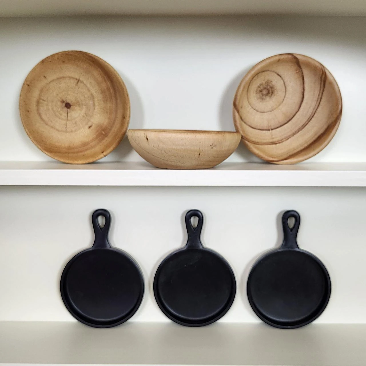 18 inch doll sized accessories  of wooden bowls and frying pans fit perfectly on the shelves to display variety of ways.