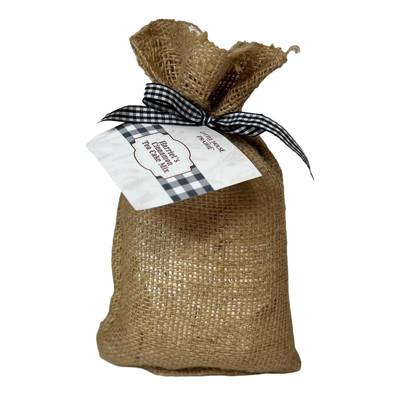 Little House on the Prairie Harriet's Tea Cake Mix packaged in burlap bag with gingham ribbon and label.