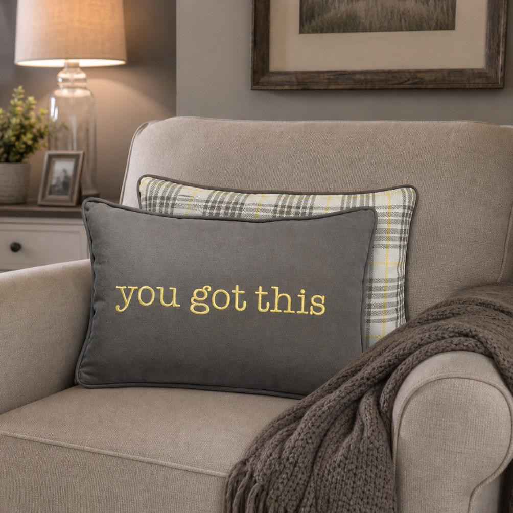 You've  got  this embroidered on a gray pillow with a plaid back.