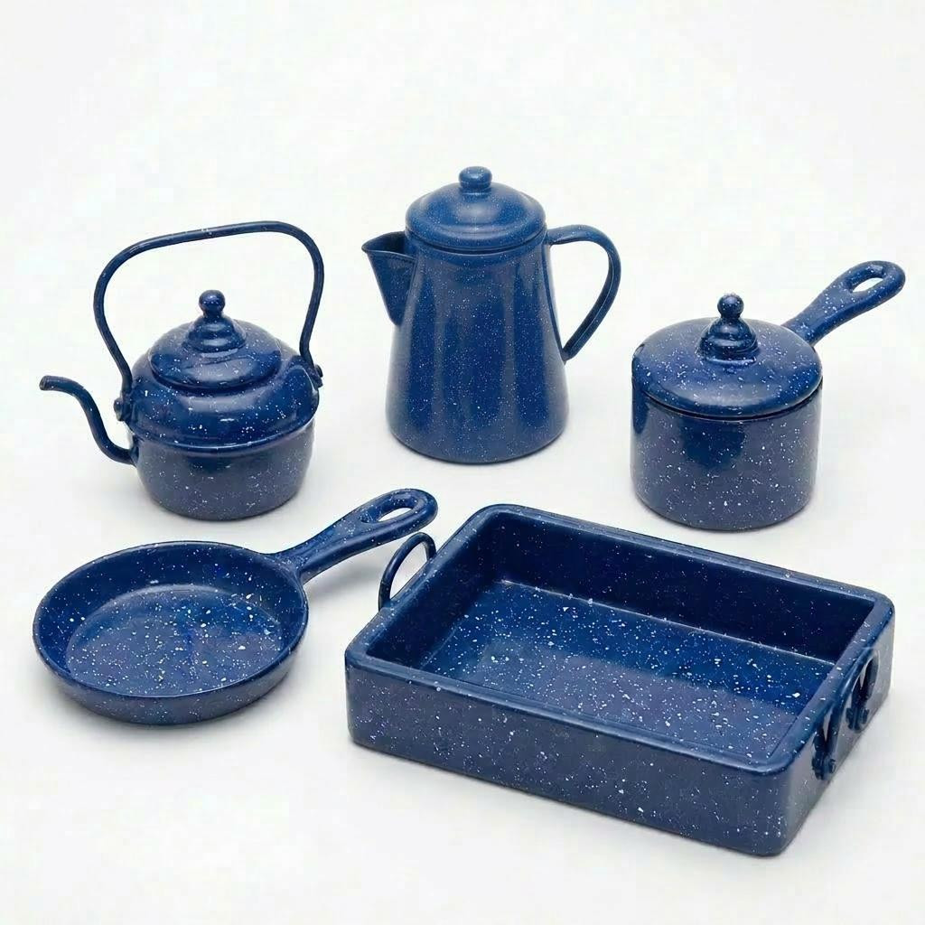 A 5-piece miniature blue speckled enamelware cookware set for 18-inch dolls against a white background.